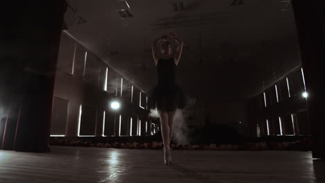 Young-Beautiful-Ballerina-On-Smoke-Stage-Dancing-Modern-Ballet.-Performs-Smooth-Movements-With-Hands