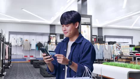 man shopping online in a clothing store