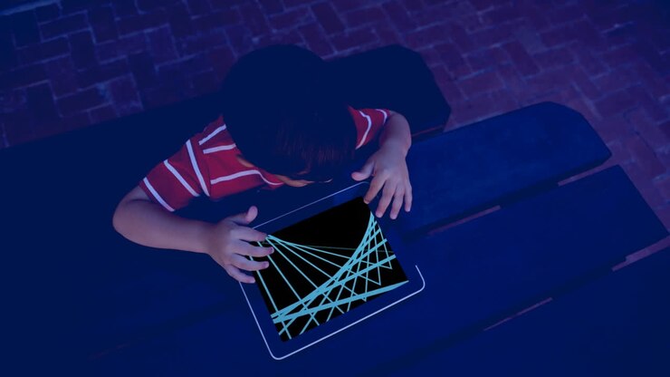 Composition of caucasian boy using tablet