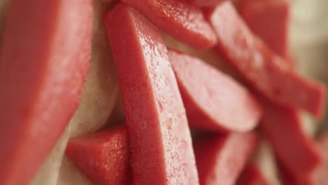 close-up of cut processed meat pieces