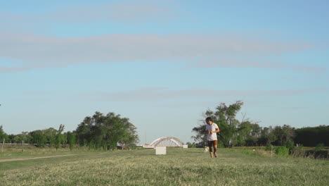 Young-Man-Running-Alongside-His-Dog