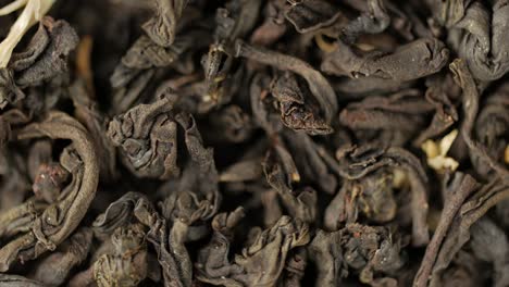 black tea leaves close up. loop rotation