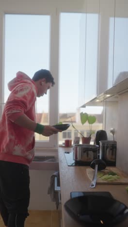 teenager cooking in a modern kitchen