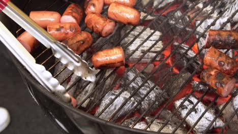 grilled sausages on charcoal grill