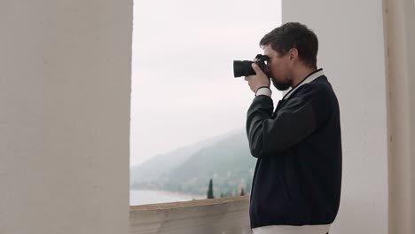 photographer taking a picture of a view