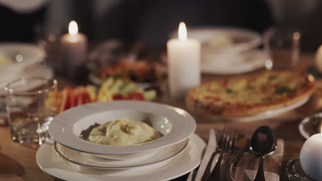 The-soup-is-placed-on-a-plate.-Festively-served-table