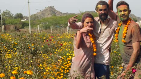 multi ethnic people celebrating the festival of colors holi in india