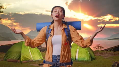 Woman Hiking and Camping at Sunset