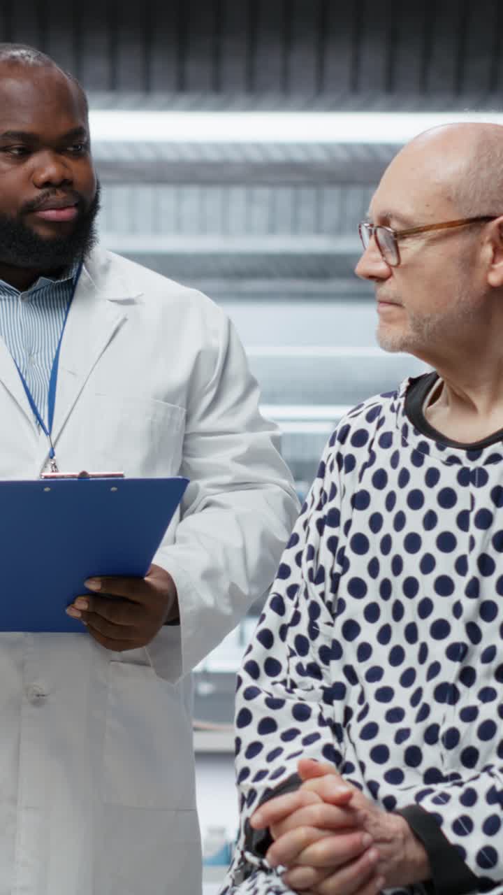 Vertical Video Portrait of smiling old patient and scientists team preparing for RD strategy
