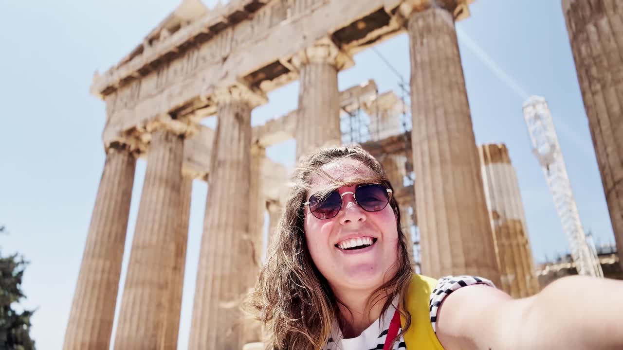 Joyful Woman Laughing for a Selfie at the Parthenon, Athens, Greece