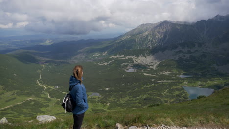 Nice-shot-of-girl-enjoying-the-scenery-of-the-tatra-mountains-including-its-wonderful-lakes