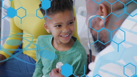 animación de datos médicos sobre un médico afroamericano y un niño paciente