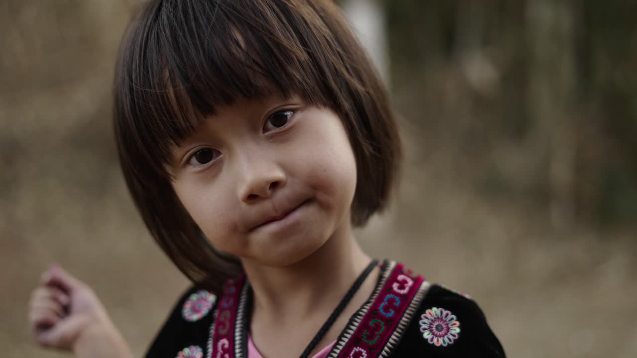 Portrait of a Young Child in Traditional Attire