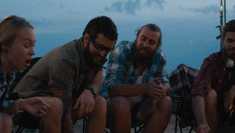 friends camping at night