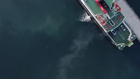 Birds-eye-view-drone-shot-of-Lochmaddy,-showing-the-Lochmaddy-to-Uig-ferry-run-by-Caledonian-Macbrayne