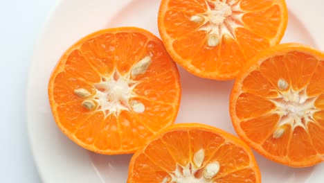 Close-up-of-slice-of-orange-fruit-in-a-bowl