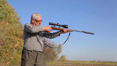 hunter aiming for a rifle a sniper hunter aiming for a rifle a sniper