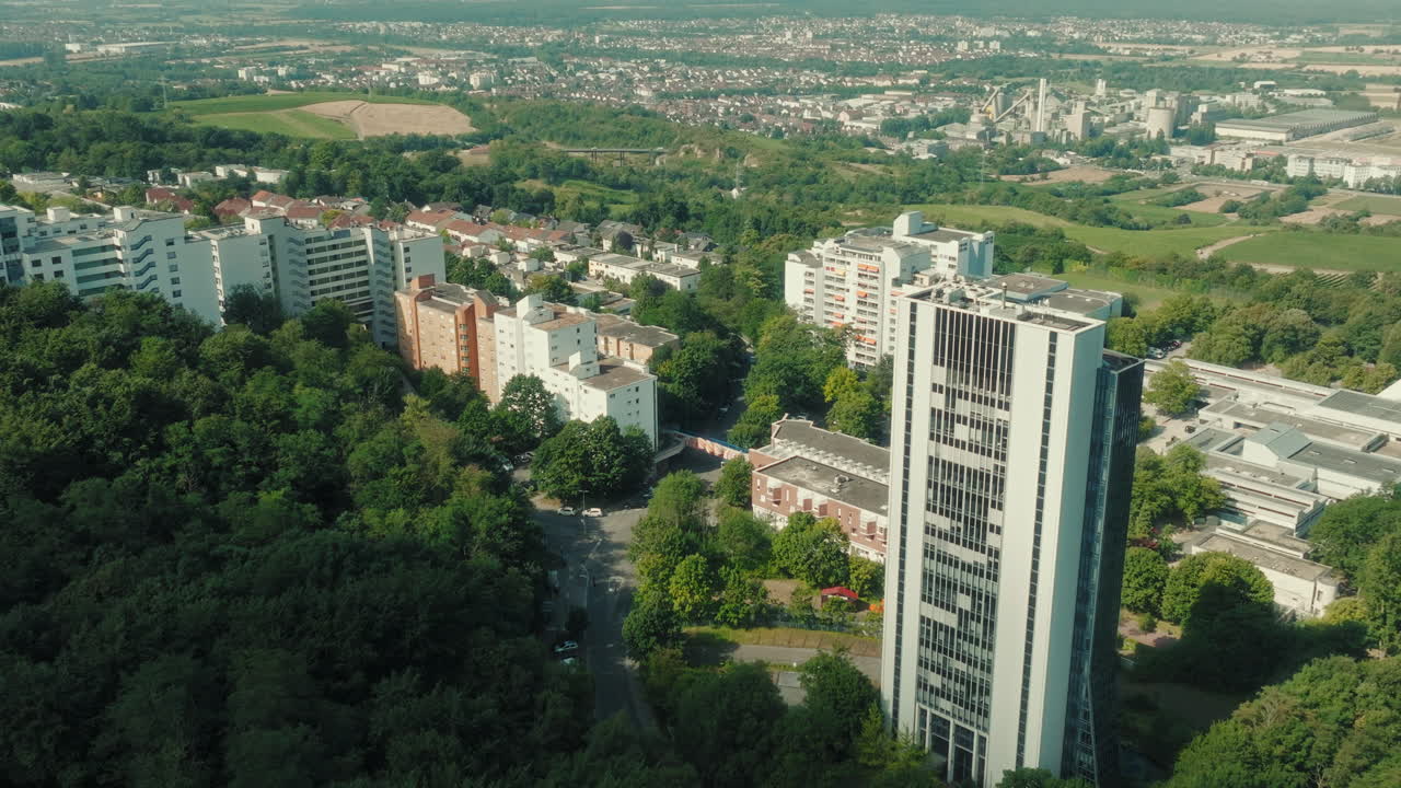 Establishing drone shot of Emmertsgrund neighborhood and cityscape during the day in Heidelberg, state of Baden-Wurttemberg, Germany