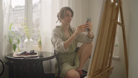 woman painting at home