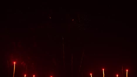real fireworks on deep black background sky, beautiful colorful fireworks shiny display at night, real time 4k footage.