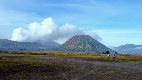 view of bromo tengger semeru national park with view of desert, savanna and mountain volcano on the background