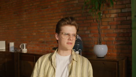 young man in striped shirt