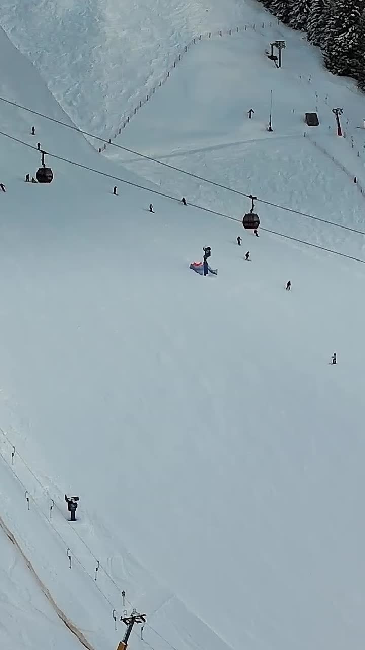 Skiers enjoy slopes in the Alps during winter in Italy