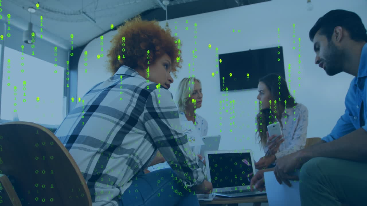 Animation of binary coding over diverse business people talking in office