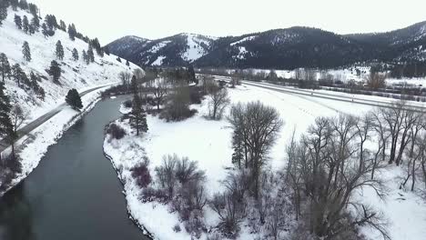 aerial - camera rises revealing the beautiful scenery along the highway