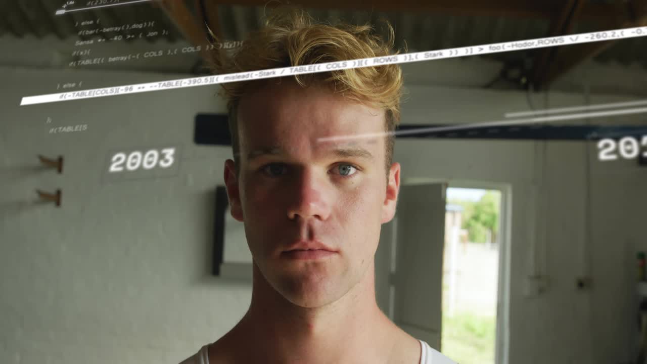 Male subject standing in garage while tech HUD appearing, animating years, sweeping, revealing face