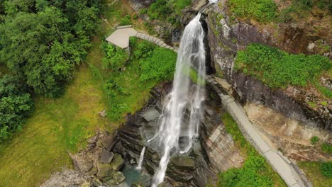 steinsdalsfossen is a waterfall in the village of steine in the municipality of kvam in hordaland county, norway. the waterfall is one of the most visited tourist sites in norway.