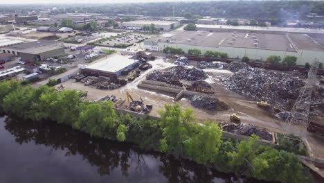 Aerial-Footage-of-metal-recycling-plant-on-the-Mississippi-River