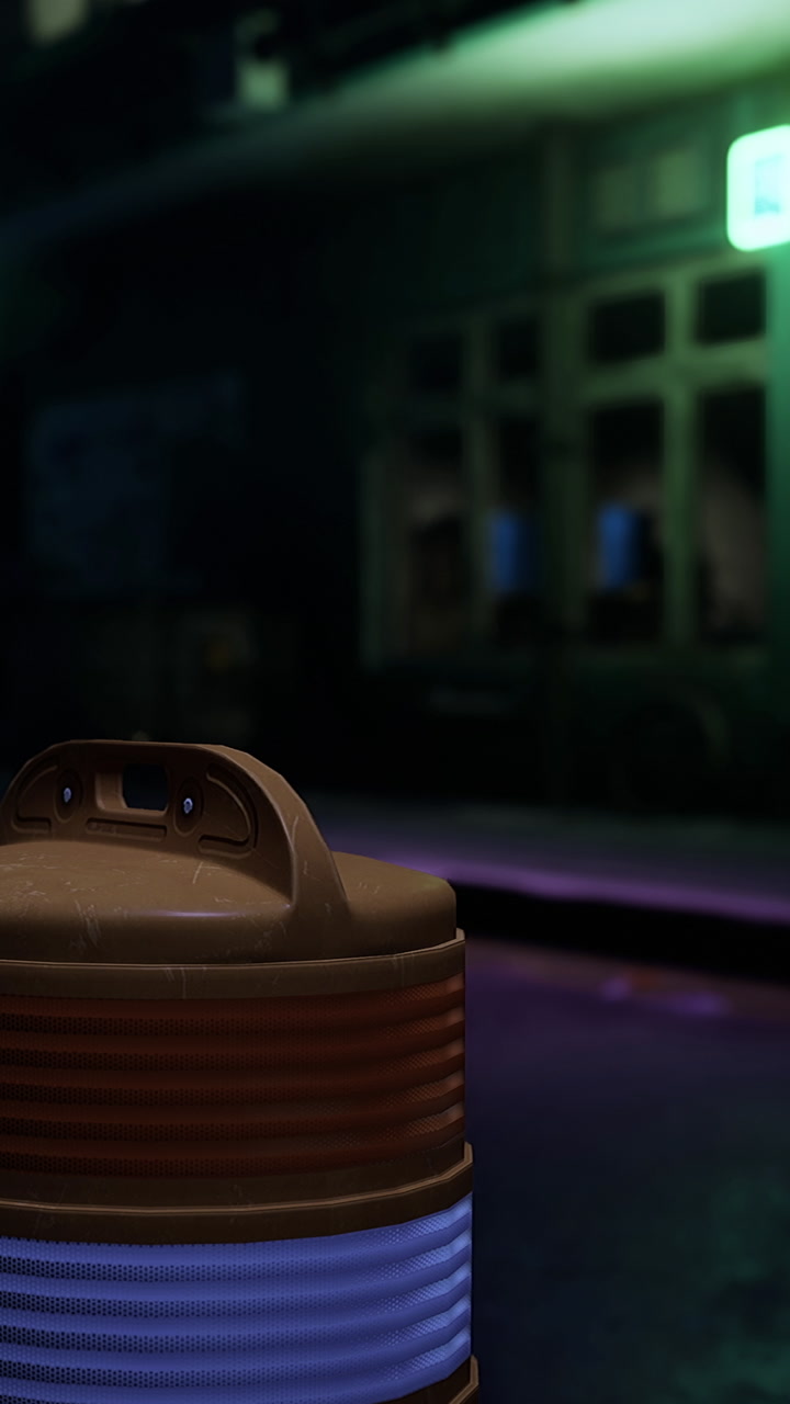 Brown container sits on ground with colors in background and space for people