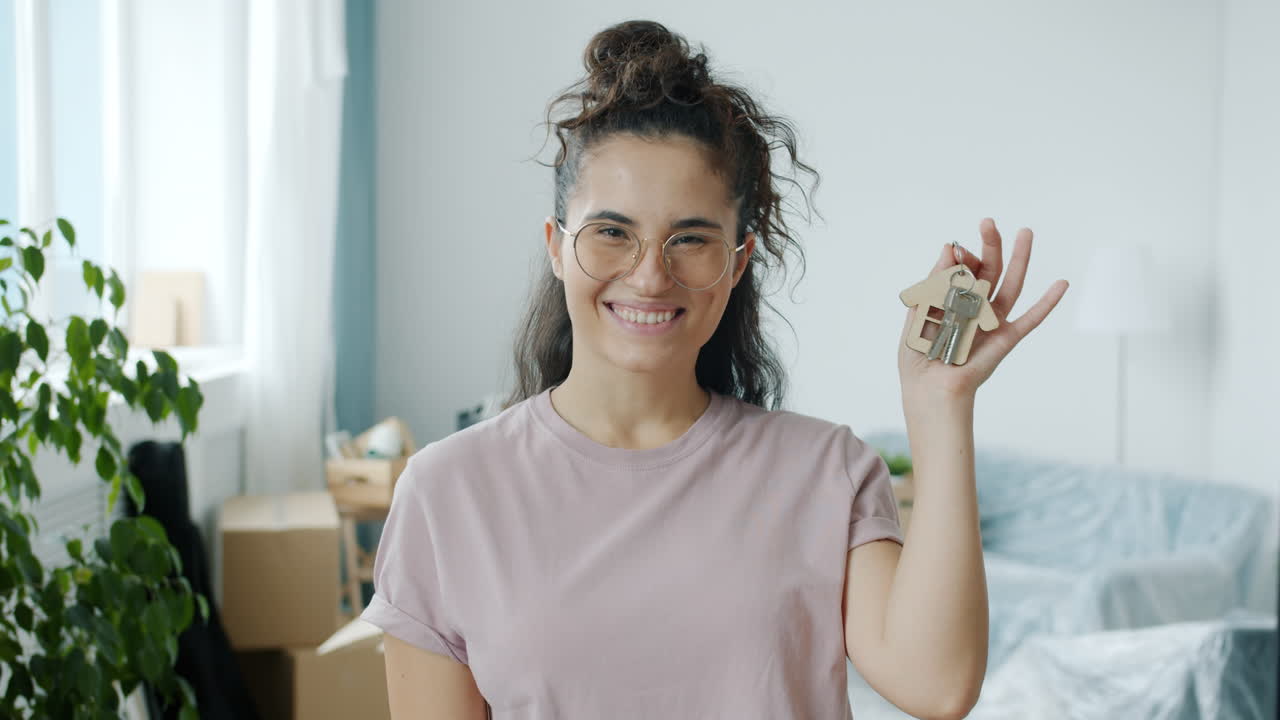 Woman Holding House Shaped Keyring