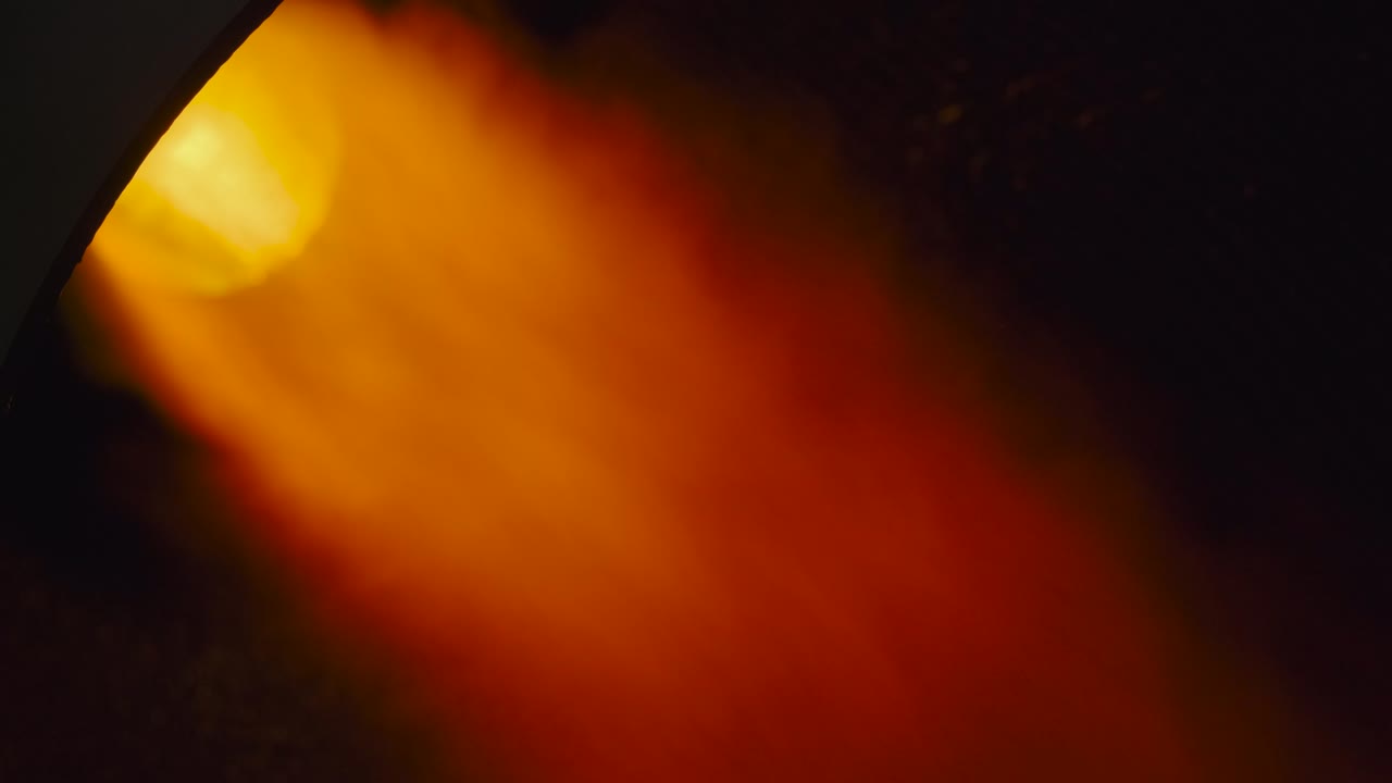 bright fire bursts from the rocket engine nozzle