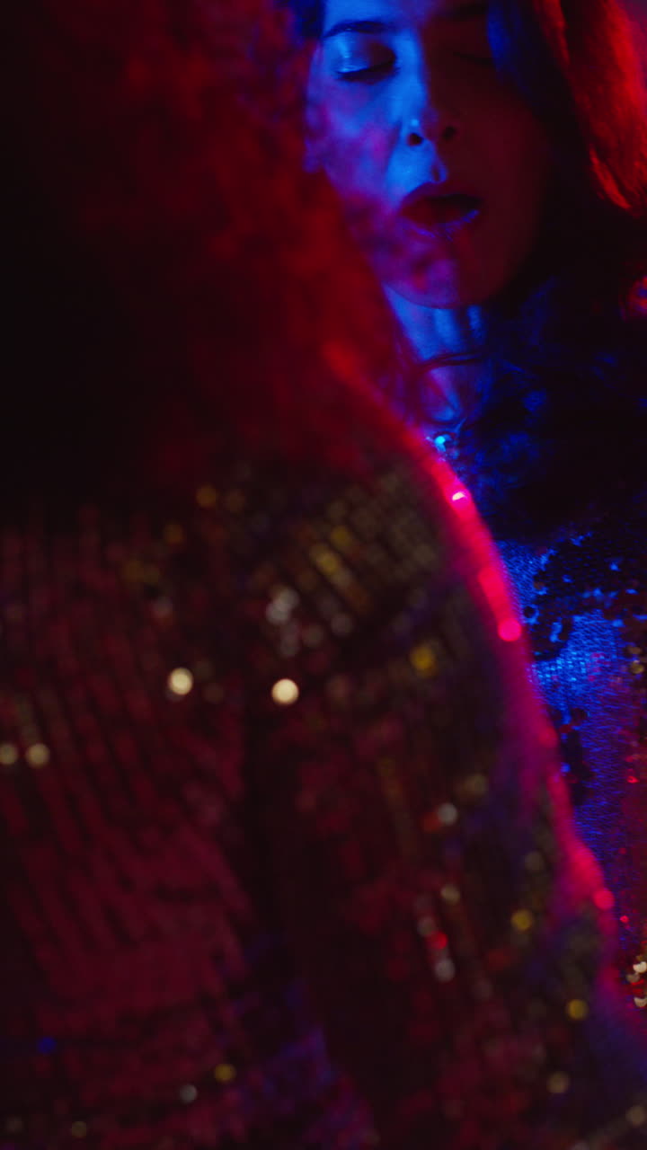 Vertical Video Of Two Women In Nightclub Bar Or Disco Dancing With Sparkling Lights In Background 4