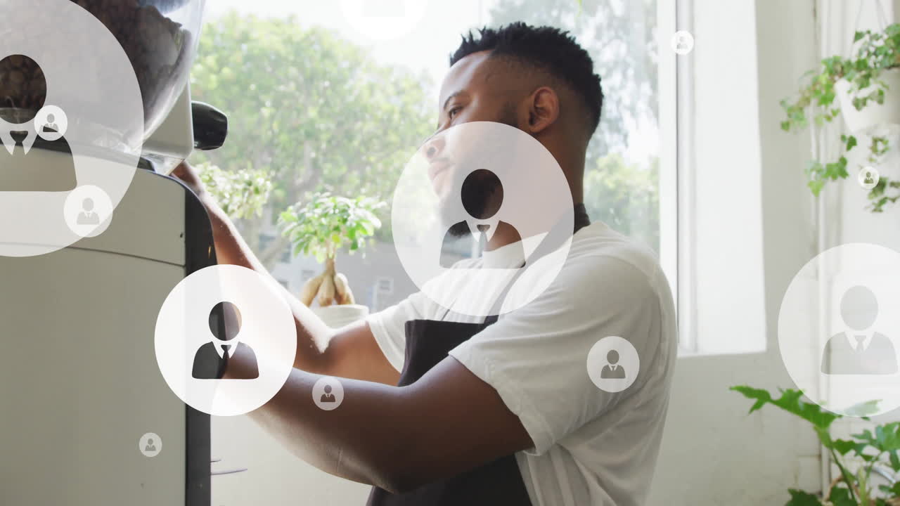 Animation of people icons over african american male barista in cafe