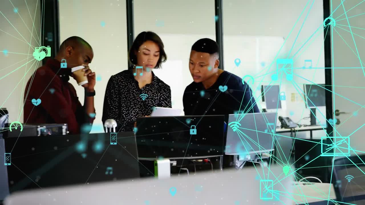 Animation of connected icons forming globes over diverse coworkers discussing reports on desktop