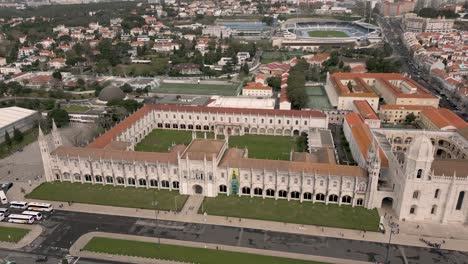 aerial establishing shot of the stunning jerónimos monastery in the heart of lisbon