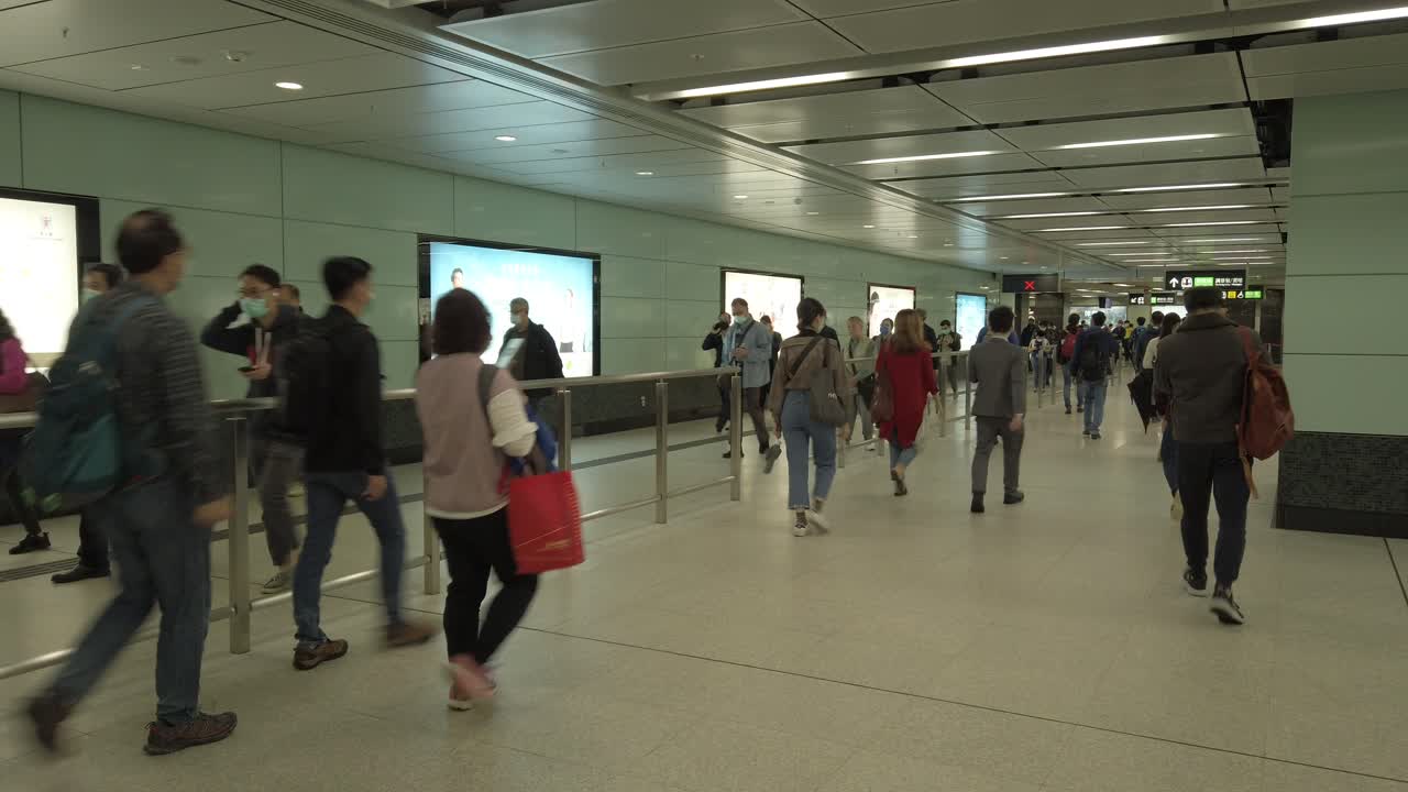 Corona Virus Pandemic, Local Commuters at Hong Kong underground MTR station.