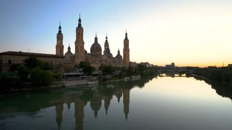 cathedral of zaragoza. river ebro. beautiful orange sunset. stabilized static footage. famous travel destination in spain