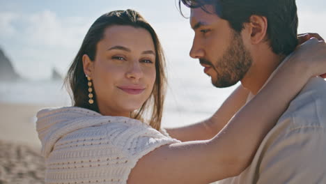 relaxed lovers posing beach looking camera close up. couple spending honeymoon