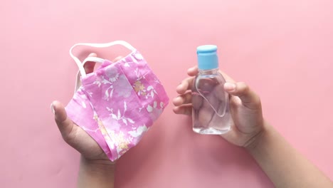 hand sanitizer and face mask
