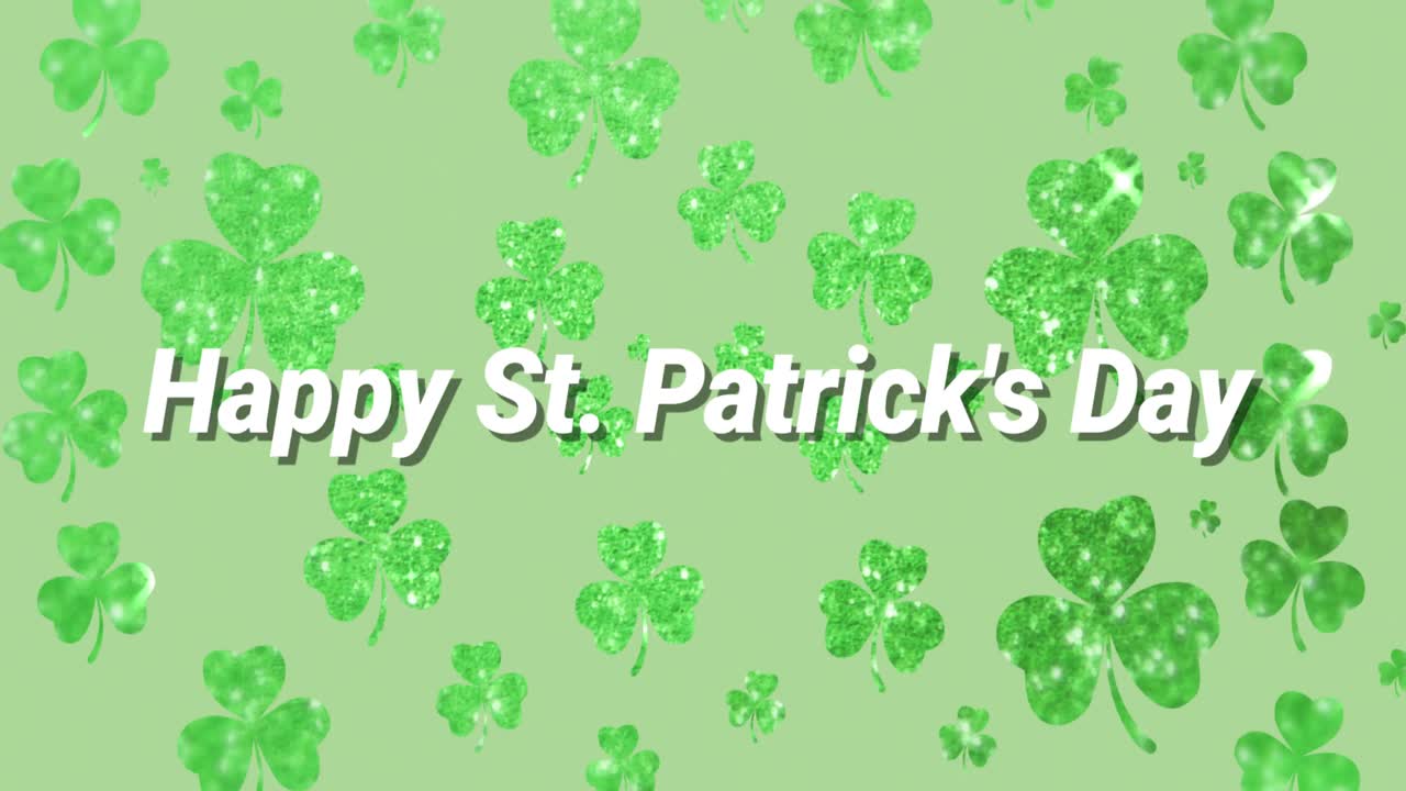 Animation of the words Happy St. Patrick's Day written on green clovers background
