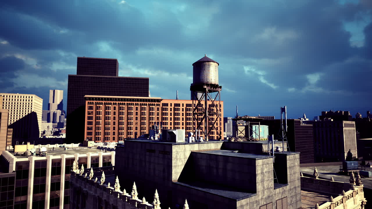 Urban skyline with water tower during cloudy day in city