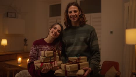 happy couple with christmas gifts