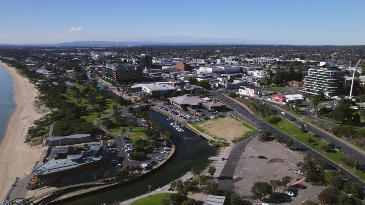 Establishing drone shot of Frankston town, in sunny Victoria, Australia