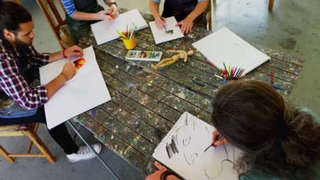 group of artist practicing drawing at table 4k