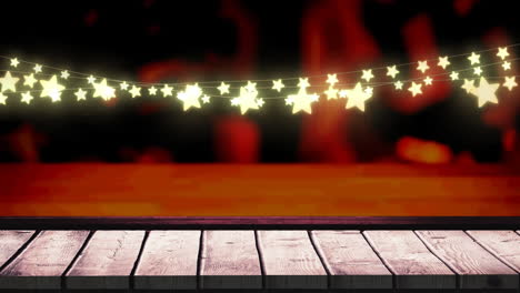 animation of fairy lights and over wooden boards