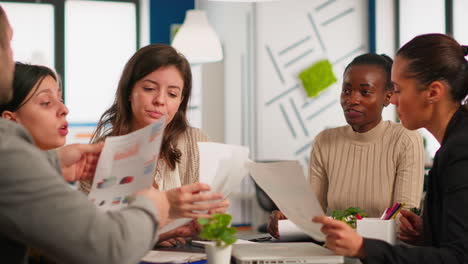group of diverse businesspeople meeting brainstorm ideas about finance project